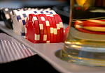 Poker table with poker chips and beer